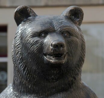 The face of a bear cast in bronze in the town square in Duns, Berwickshire. This is Wojtek the soldier bear (1942-1963)