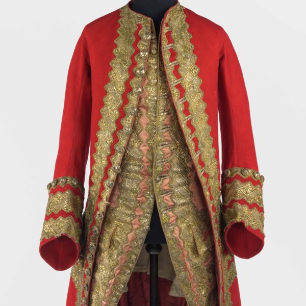 Red coat with gold embroidery and detailing, pink waistcoat with matching gold embroidery and detailing underneath- part of the costume collection at Paxton House dating from circa 1740s